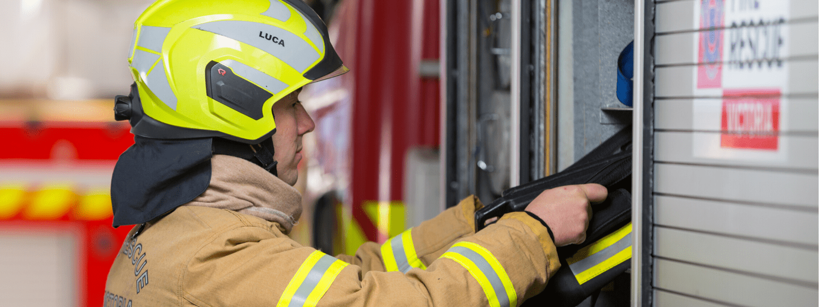 A firefighter checking a truck 