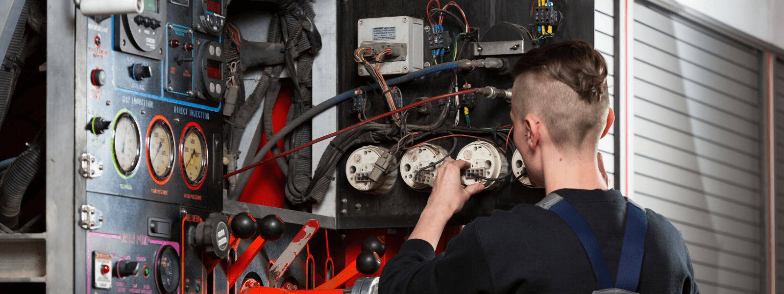 A mechanic working on a truck 