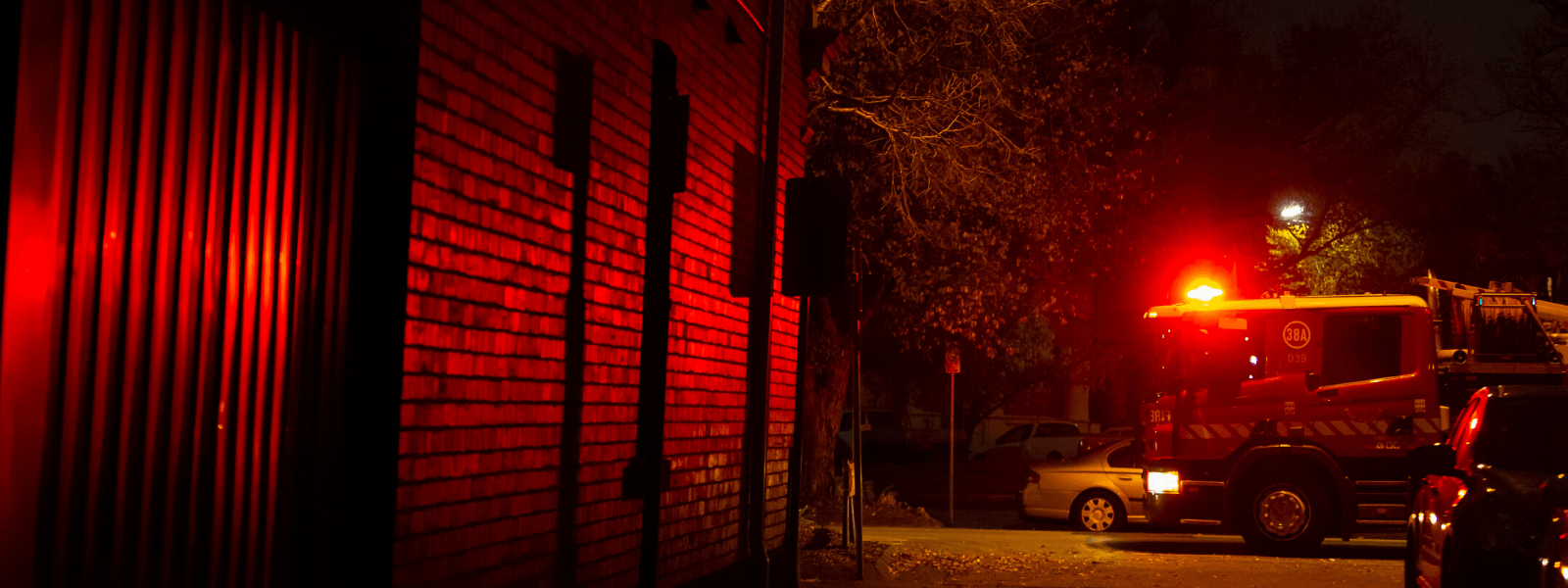 A fire truck outside a building 